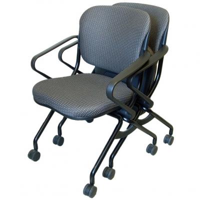 Two stacked navigator chairs with arms