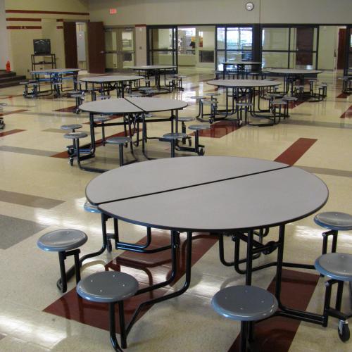 fold able round tables with 8 individual seats