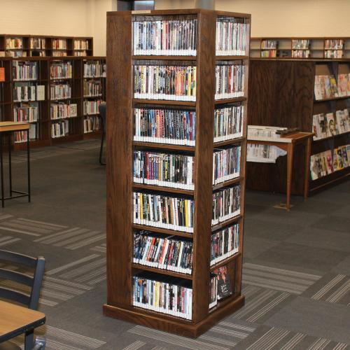 tower display bookcase with DVDs